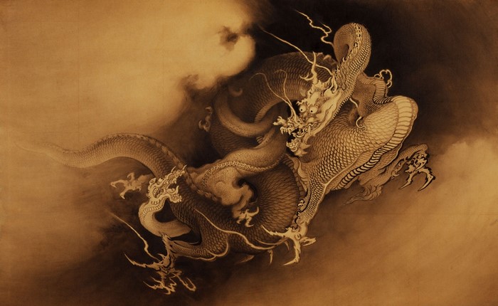Two Chinese dragons fighting amidst clouds