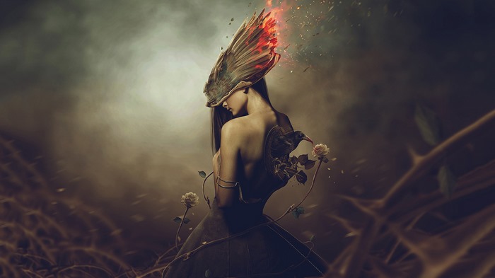 Woman with burning wings and roses