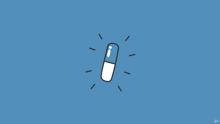 Pill with radiating lines