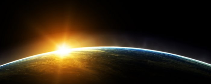 Sunrise over planet Earth from space