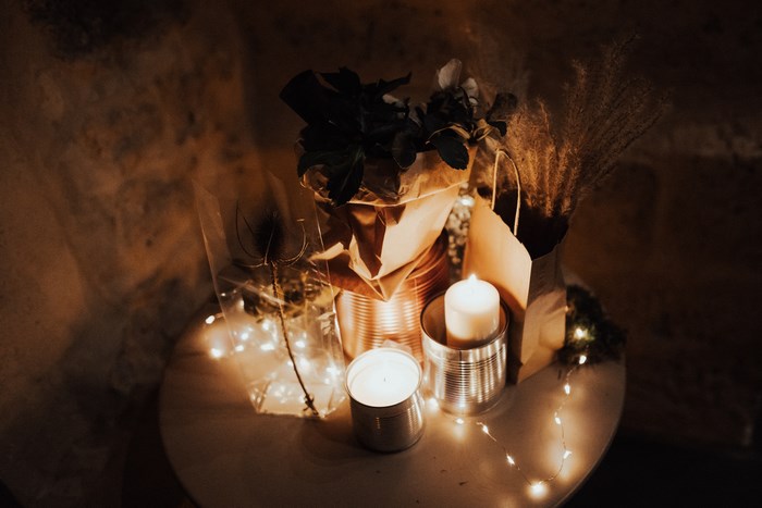 Candles and fairy lights on a table