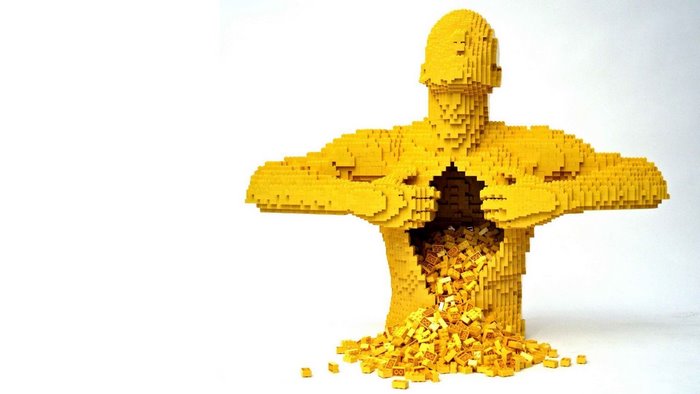 Yellow Lego Sculpture of a Man with Chest Open
