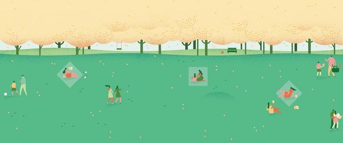People enjoying a park in autumn