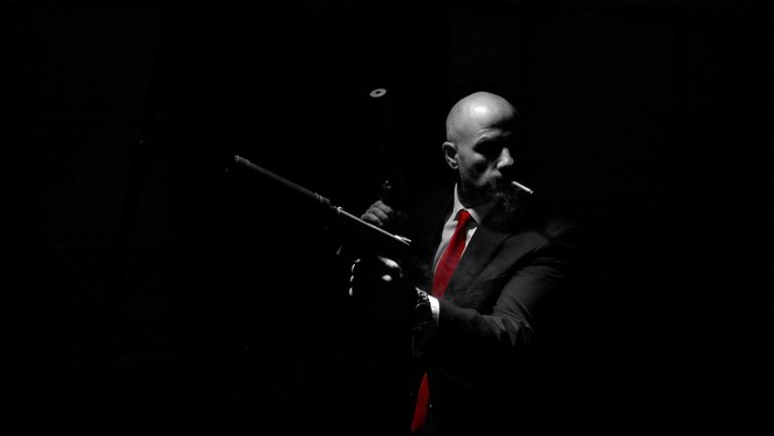 Hitman Agent 47 with gun and cigarette
