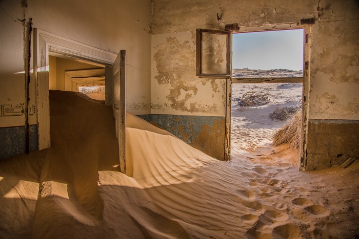 Abandoned building in Namibia filled with sand