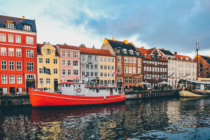 Nyhavn canal with colorful buildings and boats in Copenhagen