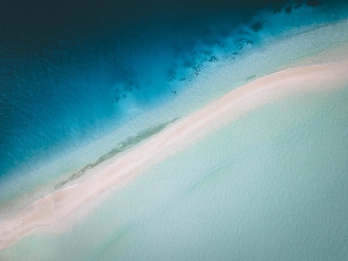 Aerial view of a sand spit in the Maldives