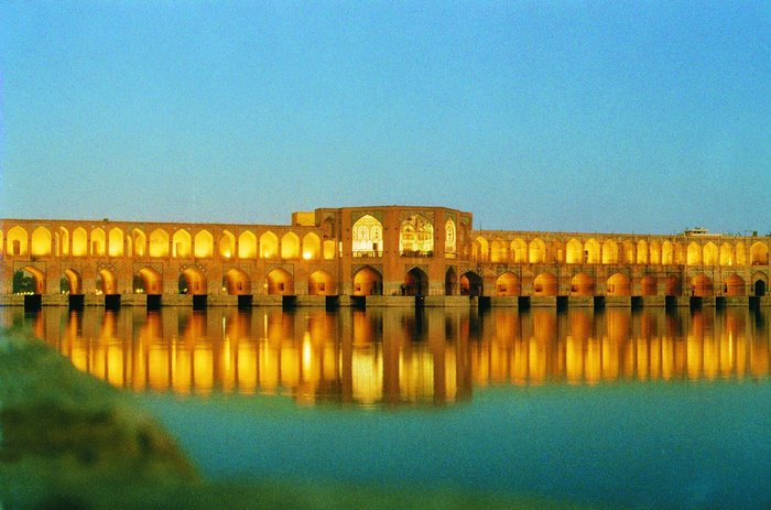 Illuminated Imam Bridge in Isfahan at Twilight
