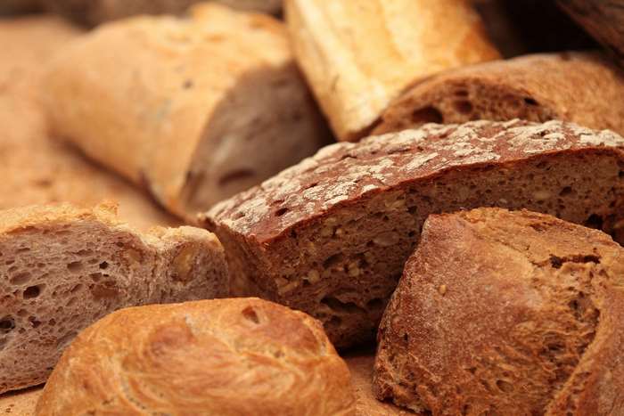 Assortment of freshly baked bread loaves