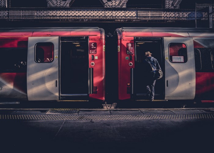 Man boarding a train at Waverley Station