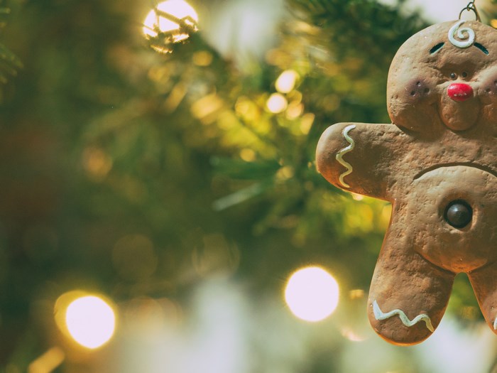 Gingerbread man ornament on a Christmas tree