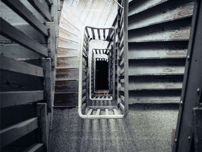 Old wooden staircase looking down