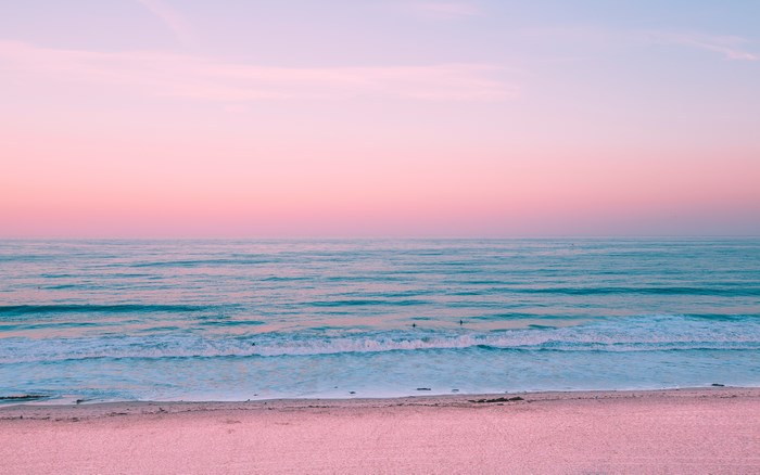 Pastel Pink and Blue Ocean Sunset with Waves