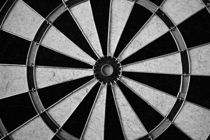 Close-up of a black and white dartboard