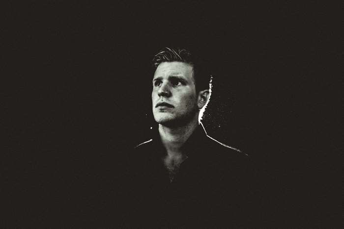 Man looking up in black and white portrait 4K