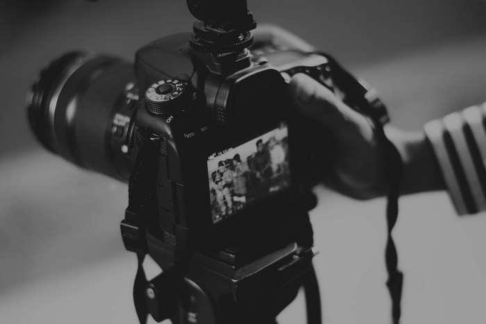 Black and white close-up of a digital camera