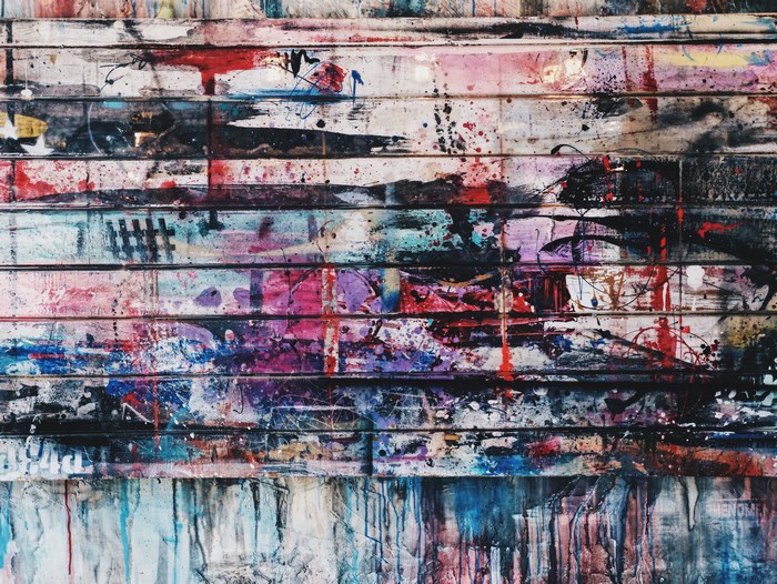 Paint splatter on a wooden surface