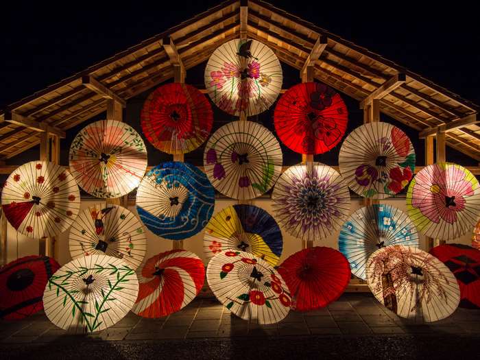 Japanese umbrellas illuminated at night