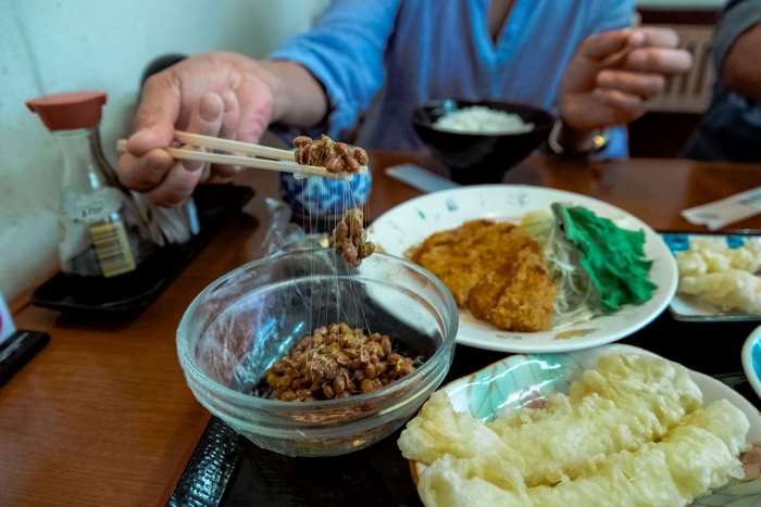 Japanese food with natto and chopsticks