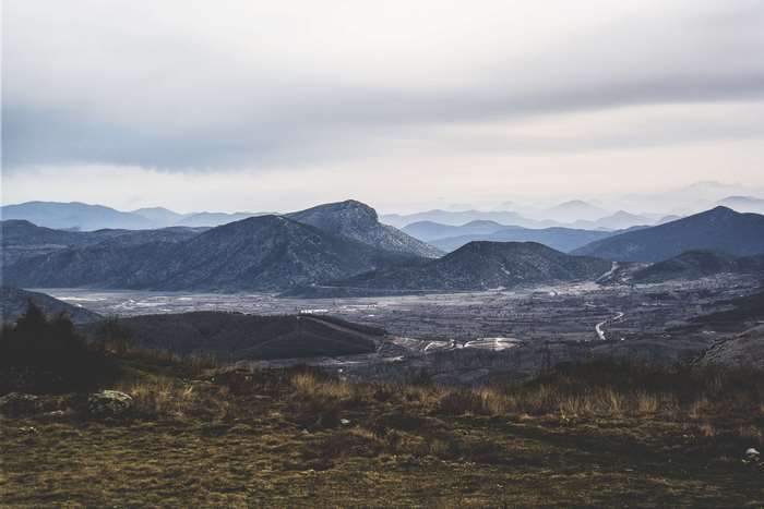 Mountain landscape with rolling hills and grassland