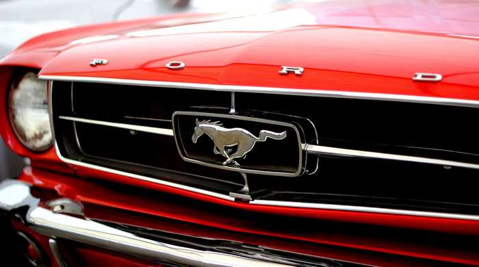 Red Ford Mustang with Running Horse Emblem