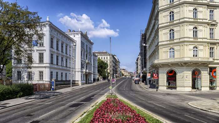 Street view of Vienna with buildings and flowers