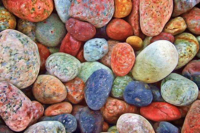 Colorful smooth pebbles and stones in a pile