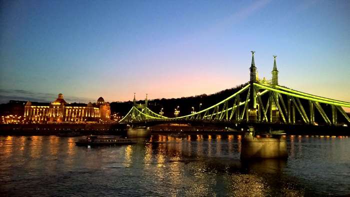Liberty Bridge over Danube River in Budapest at dusk