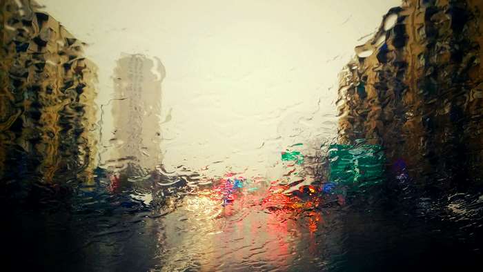 City street view through a rainy window 4K
