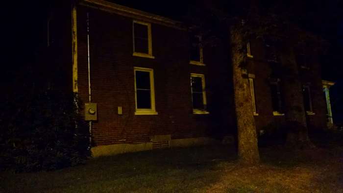 Dark brick house at night 4K