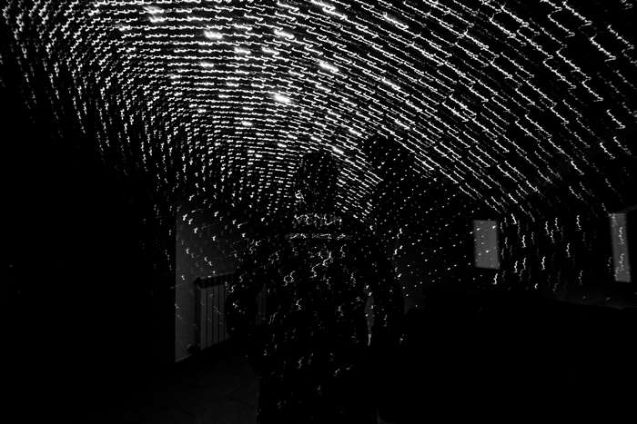 Light painting trails in a dark tunnel
