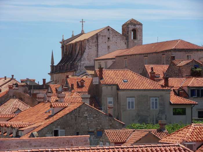 Dubrovnik cityscape with church and tiled roofs
