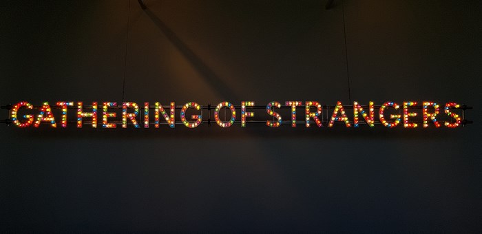 Gathering of Strangers neon sign