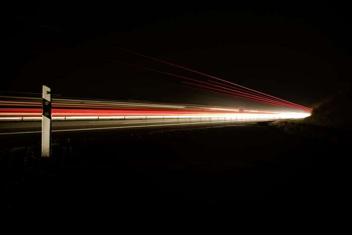 Light streaks on a highway at night