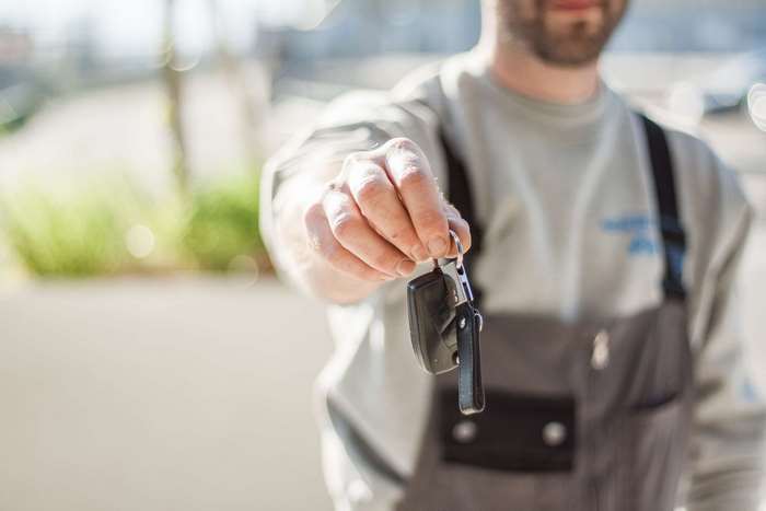 Man holding car keys
