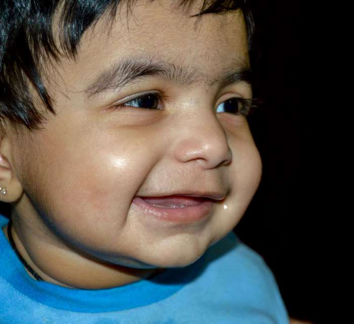 Close-up of a smiling baby girl