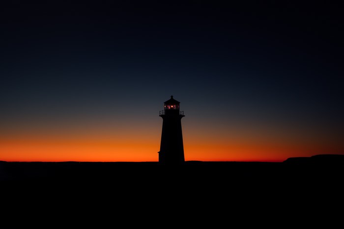 Silhouette of Peggy's Cove Lighthouse at Dusk