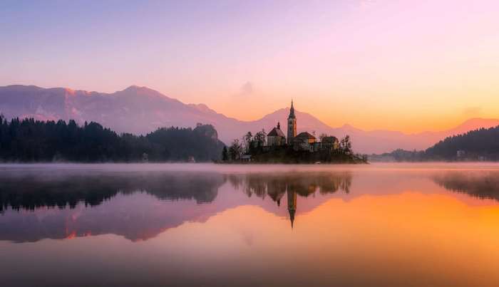 Island church on Lake Bled at sunrise, Slovenia