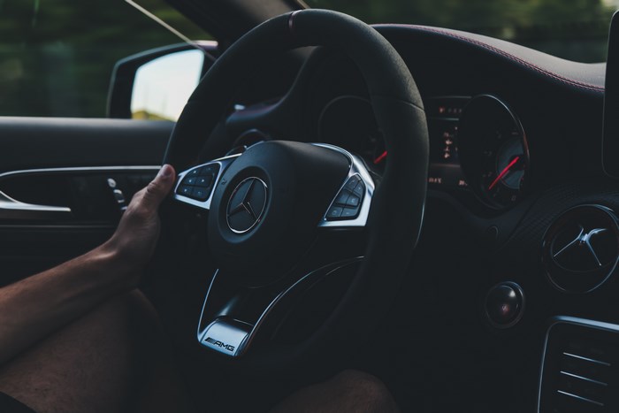Mercedes-Benz AMG Steering Wheel with Hand Driving