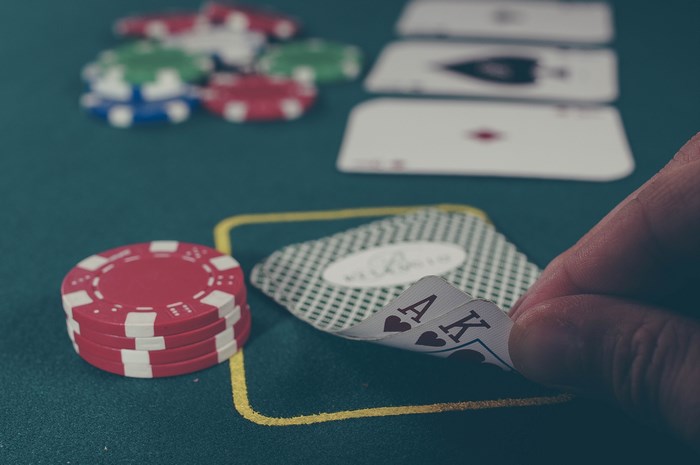 Poker game with Ace and King cards and chips