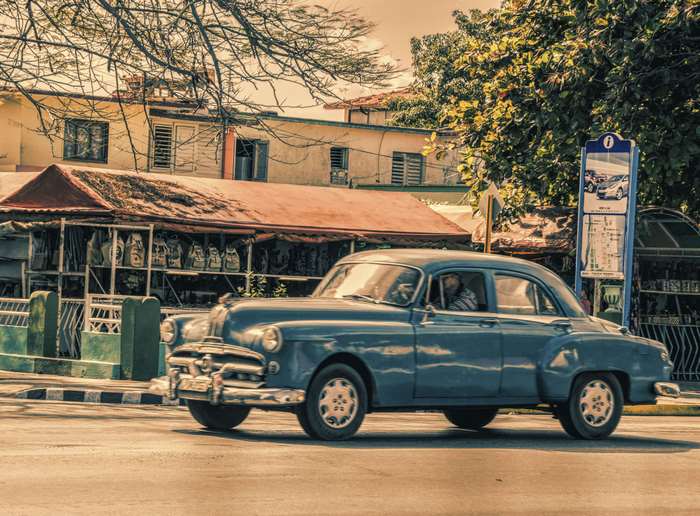 Blue classic car driving in Cuba 4K