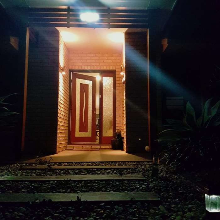 Front door of a house at night