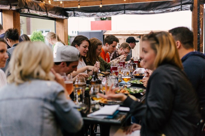 People enjoying a meal together at a restaurant