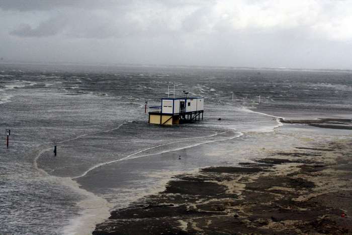 Stormy North Sea with Flooded Beach Hut