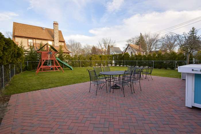 Backyard with patio and swing set