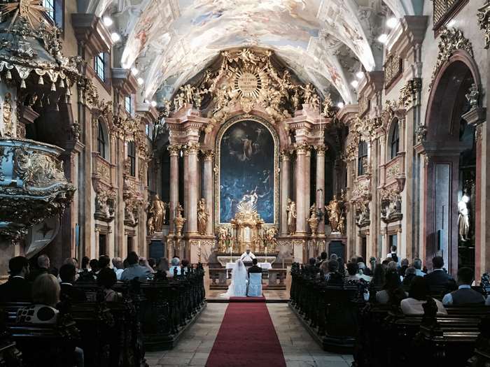 Wedding ceremony in a richly decorated church