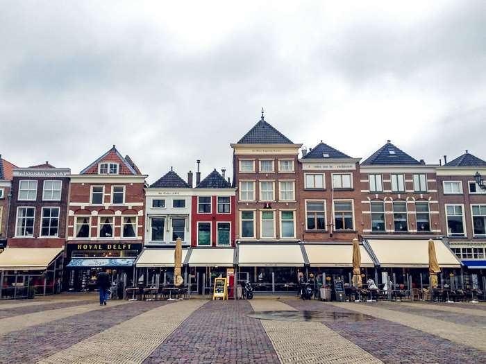 Royal Delft buildings in a European square in Delft, Netherlands