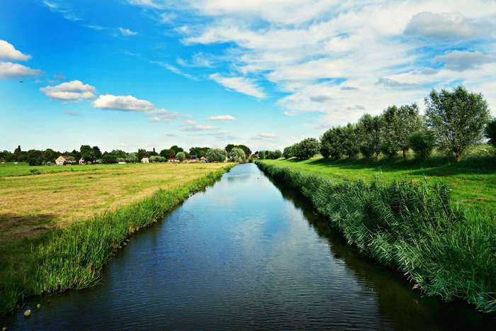 Dutch Landscape with Canal and Village