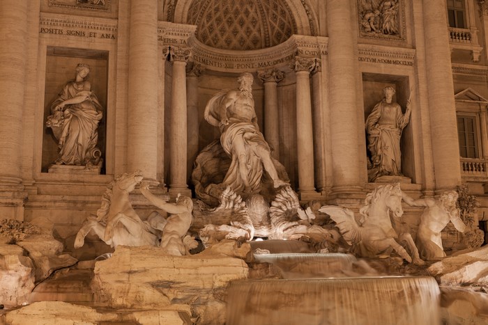 Trevi Fountain sculptures at night