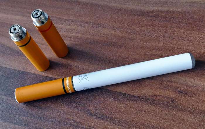 Electronic cigarettes on a wooden surface